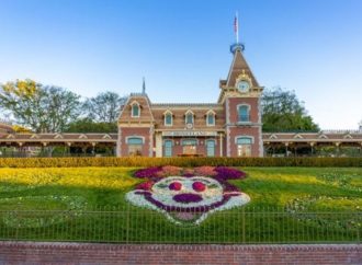 Minnie Mouse floral display graces the front of the Disneyland Train Station